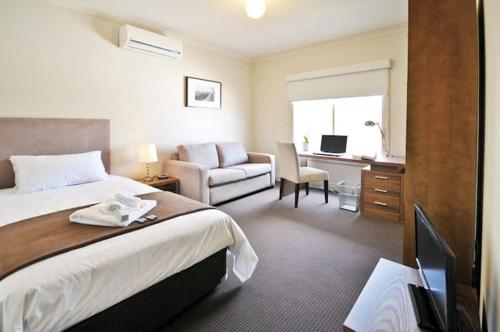 Postel nebo postele na pokoji v ubytování 4C- Executive Rooms in Premium Shared Accommodation