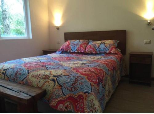 Ένα ή περισσότερα κρεβάτια σε δωμάτιο στο Dpto 4 personas 1er piso con patio Pucon