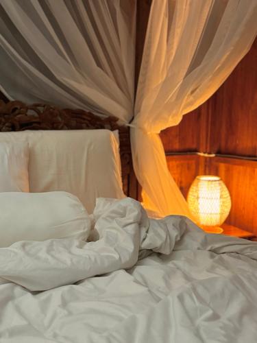 Ένα ή περισσότερα κρεβάτια σε δωμάτιο στο True Bali Villa