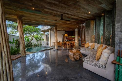 Χώρος καθιστικού στο Aryaswara Villa Ubud