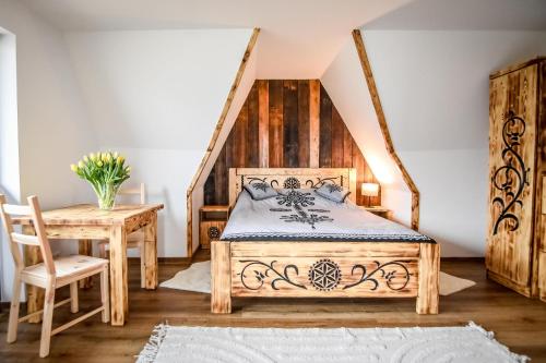 Ένα ή περισσότερα κρεβάτια σε δωμάτιο στο MICHASIÓWKA