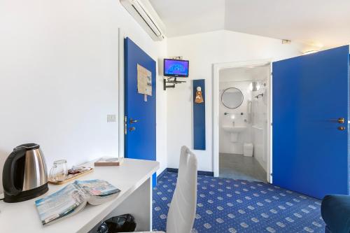 TV o dispositivi per l'intrattenimento presso Bike & Wind Hotel Villa Maria