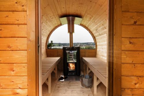 an inside view of a sauna with an open window at Seeluft direkt am Wasser in Reichenau