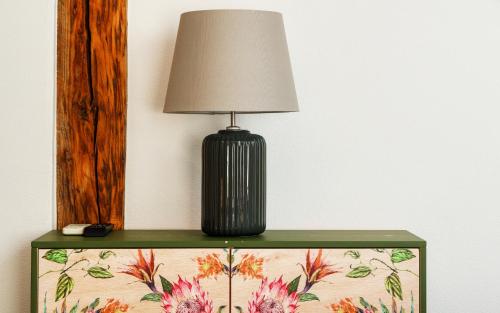 a lamp sitting on top of a table at Penzion Terasa Cibulka in Mikulov