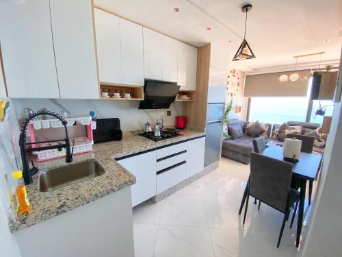 Kuchyň nebo kuchyňský kout v ubytování Appartment bades alhoceima