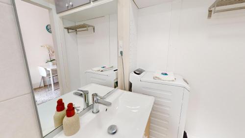 Koupelna v ubytování La Symphonie de l'Orangerie