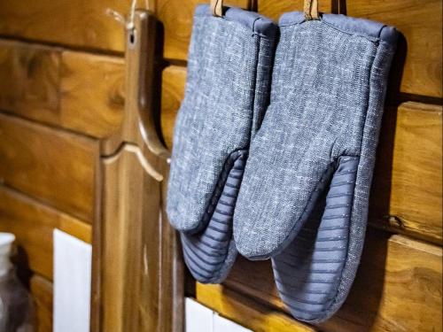 a pair of gray socks hanging on a wall at Chicuanga in Chizavane