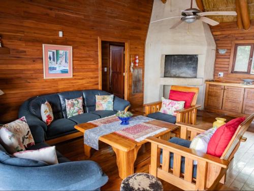 a living room with a couch and a table at Chicuanga in Chizavane