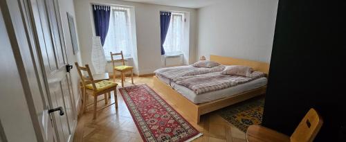 Postel nebo postele na pokoji v ubytování Ferienwohnung Haus Ryter