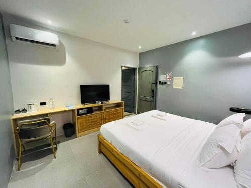 Télévision ou salle de divertissement dans l'établissement Only Seed Resort 欧芮希度假酒店