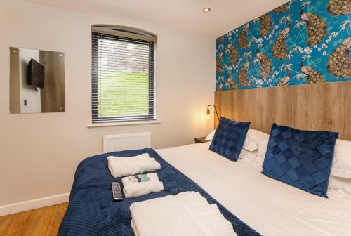 Ένα ή περισσότερα κρεβάτια σε δωμάτιο στο City Apartments - Monkbar Mews