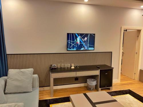 TV a/nebo společenská místnost v ubytování Royal East Resort