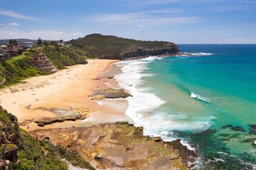 an aerial view of a beach with the ocean at Seaside Haven Tranquil Beachside Escape in Warriewood