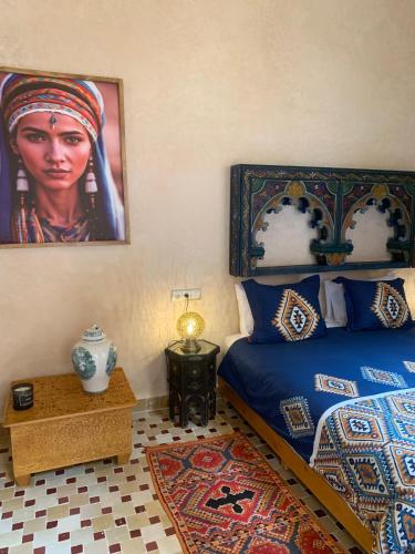 Una cama o camas en una habitación de Alibaba Riad