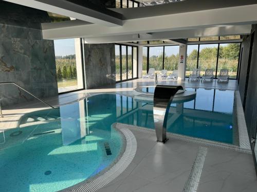 Bazén v ubytování Villa Posh All Suites Hotel & SPA nebo v jeho okolí