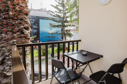 a balcony with a table and chairs on it at Apartamento Brisa Marina in Arona