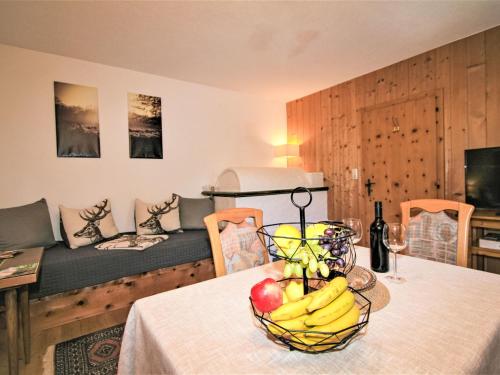 a bowl of fruit on a table in a room at Apartment Wandegg by Interhome in Ginzling
