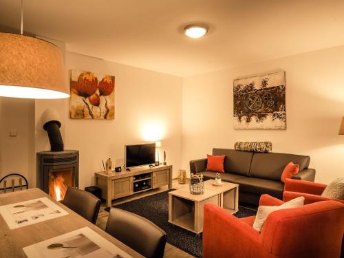 TV a/nebo společenská místnost v ubytování Holiday Home Residence Lipno-7 by Interhome