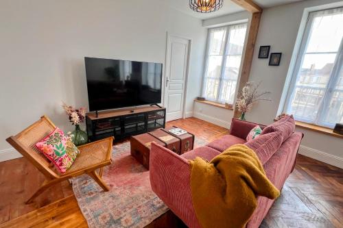 Μια τηλεόραση ή/και κέντρο ψυχαγωγίας στο Appartement L’Éclat du Colza