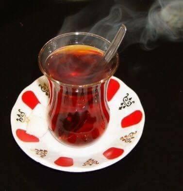 a cup of tea on a plate with smoke at Népliget Hotel in Budapest