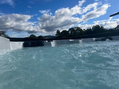 a jacuzzi plunge pool with water in it at Hunter Explorer - Games Room & Outdoor Spa in Cessnock