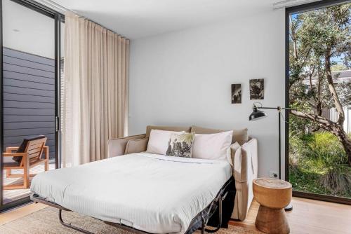 Ένα ή περισσότερα κρεβάτια σε δωμάτιο στο Privately Managed Villa 13 Bangalay Luxury Villas