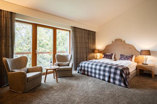 Postel nebo postele na pokoji v ubytování Hotel Exquisit