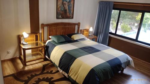 En eller flere senge i et værelse på Quinta Fula Fula