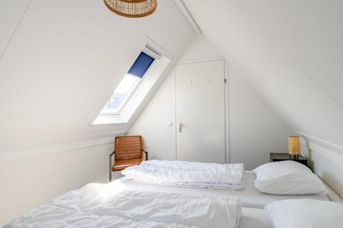 Ένα ή περισσότερα κρεβάτια σε δωμάτιο στο Plevierstraat 3a