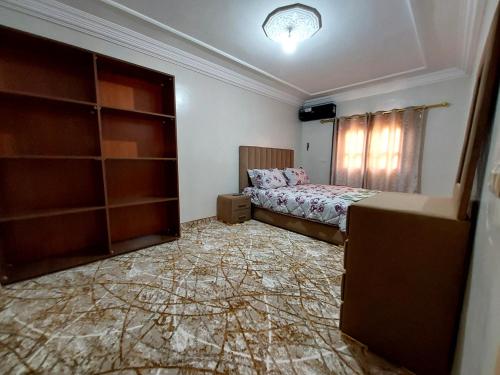 Postel nebo postele na pokoji v ubytování Appartement Bourkaik