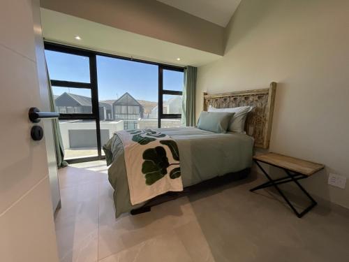 Ένα ή περισσότερα κρεβάτια σε δωμάτιο στο Northern Valleys Family Condo
