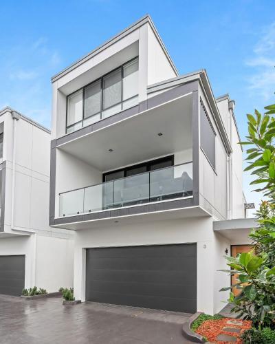 an image of a white house at Lakeview Luxury Work from home spaces in Warners Bay