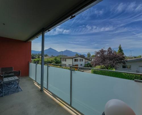 a balcony with a view of the mountains at Ferienwohnung " Entspannung mit Flair " in Dornbirn