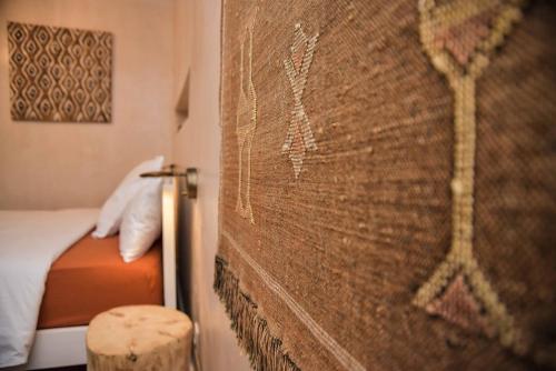 Ένα ή περισσότερα κρεβάτια σε δωμάτιο στο Boabdil Guesthouse