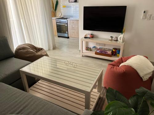 Studio with Private Door Front Seating Area at La Hacienda