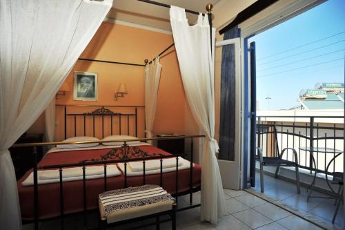 Postel nebo postele na pokoji v ubytování Pergola Hotel