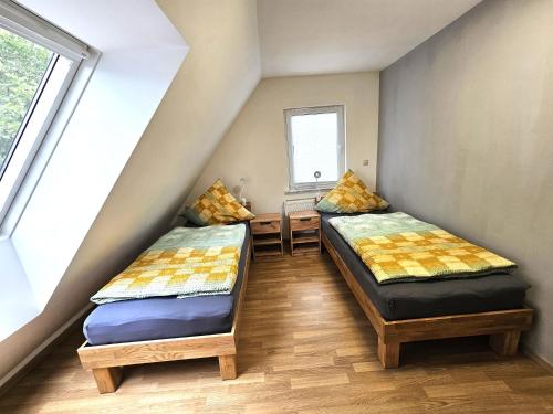 Ένα ή περισσότερα κρεβάτια σε δωμάτιο στο Ferienwohnung Heilbronn