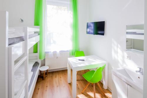 Ένα ή περισσότερα κρεβάτια σε δωμάτιο στο SecondHome Stuttgart - Very nice apartment near historic city centre at Blumenstr 58 in Esslingen am Neckar - W2