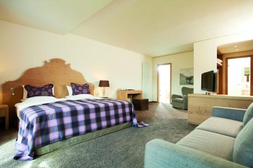 Hotel Exquisitにあるベッド