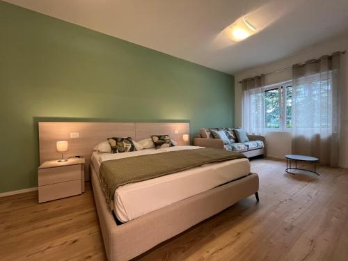 Postel nebo postele na pokoji v ubytování Al Boschetto Rooms