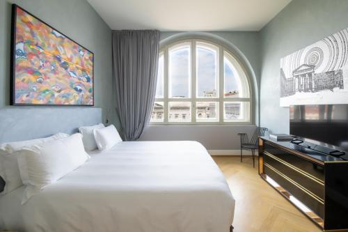 Un ou plusieurs lits dans un hébergement de l'établissement Galleria Vik Milano - Townhouse Galleria - Small Luxury Hotels of the World