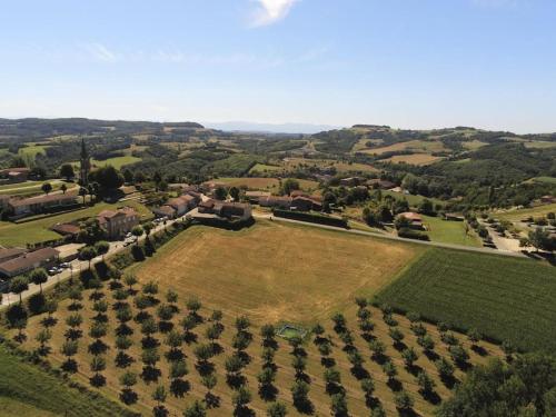 an aerial view of a large field with trees at les collines de la Drôme in Saint-Martin-dʼAoût