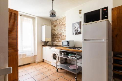 Kuchyň nebo kuchyňský kout v ubytování DIFY Adelaide Perrin - Ainay