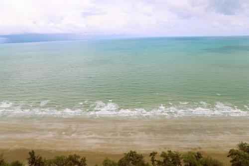 an aerial view of a beach with the ocean at Beach front Apartment with Sea View VIP CONDOCHAIN in Rayong