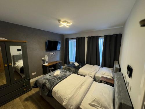 Cama o camas de una habitación en Heart of Hull Hotel