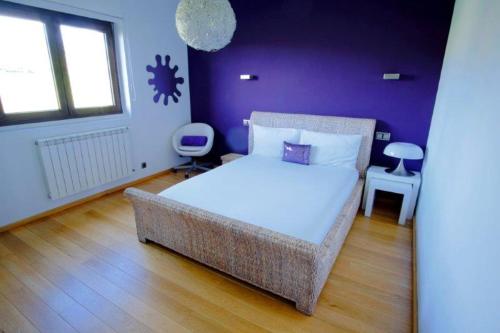 Postel nebo postele na pokoji v ubytování La Casa de Orviz