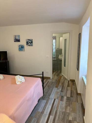 Ένα ή περισσότερα κρεβάτια σε δωμάτιο στο Appartamento Il Mortaio