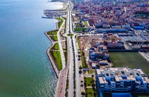 an aerial view of a highway next to the water at Nador corniche gare mcdonal in Nador