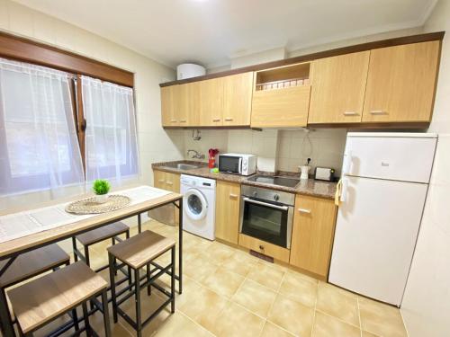 Η κουζίνα ή μικρή κουζίνα στο Itos Flats Pravia