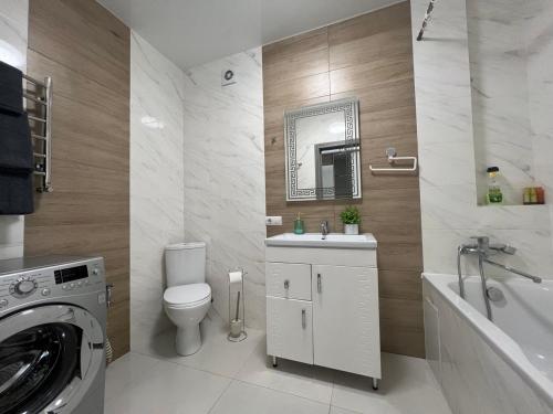 Ванная комната в Apartments VIP AVALON
